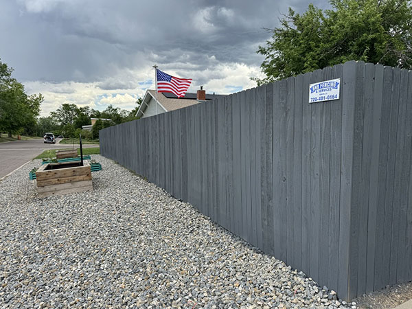 6 foot cedar fence in Denver with custom staining