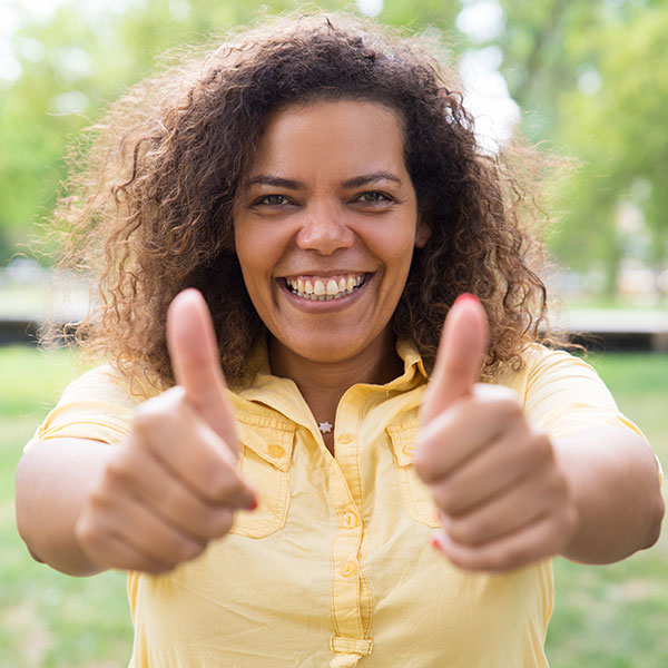 happy owner of a wood fence with metal rails